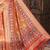 Orange color patola design and silver coin weaving pure patola silk saree