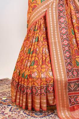 orange patola design and silver coin weaving pure patola silk saree 5
