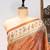 Light orange color warli printed tissue tussar silk saree