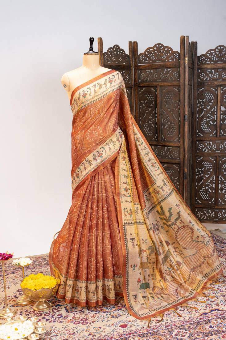Light orange color warli printed tissue tussar silk saree
