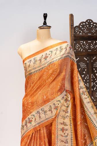 Orange color warli printed tissue tussar silk saree