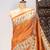 Orange color warli printed tissue tussar silk saree