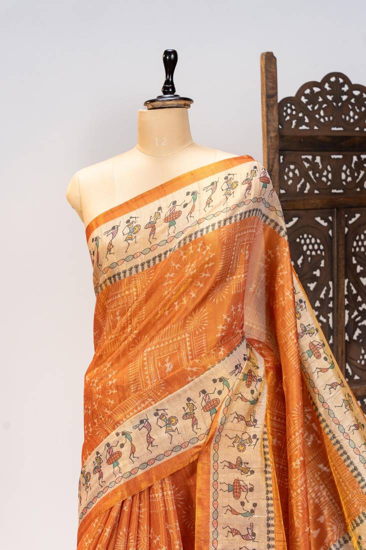 Orange color warli printed tissue tussar silk saree
