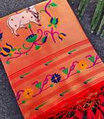 Red color small butties and fully zari woven paithani silk saree