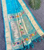 Sky blue color small butties and fully zari woven paithani silk saree
