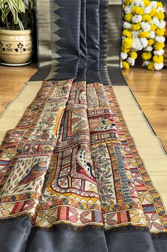 Dark grey color madhubani hand type print and zari weaving tussar silk saree
