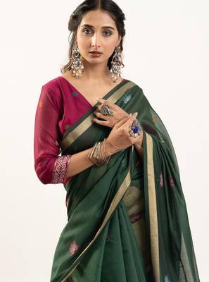 dark green lotus and zari weaving muga cotton saree 2