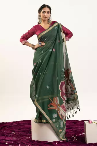 dark green lotus and zari weaving muga cotton saree