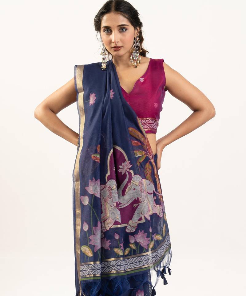 Navy blue color lotus , musa and zari weaving  muga cotton saree