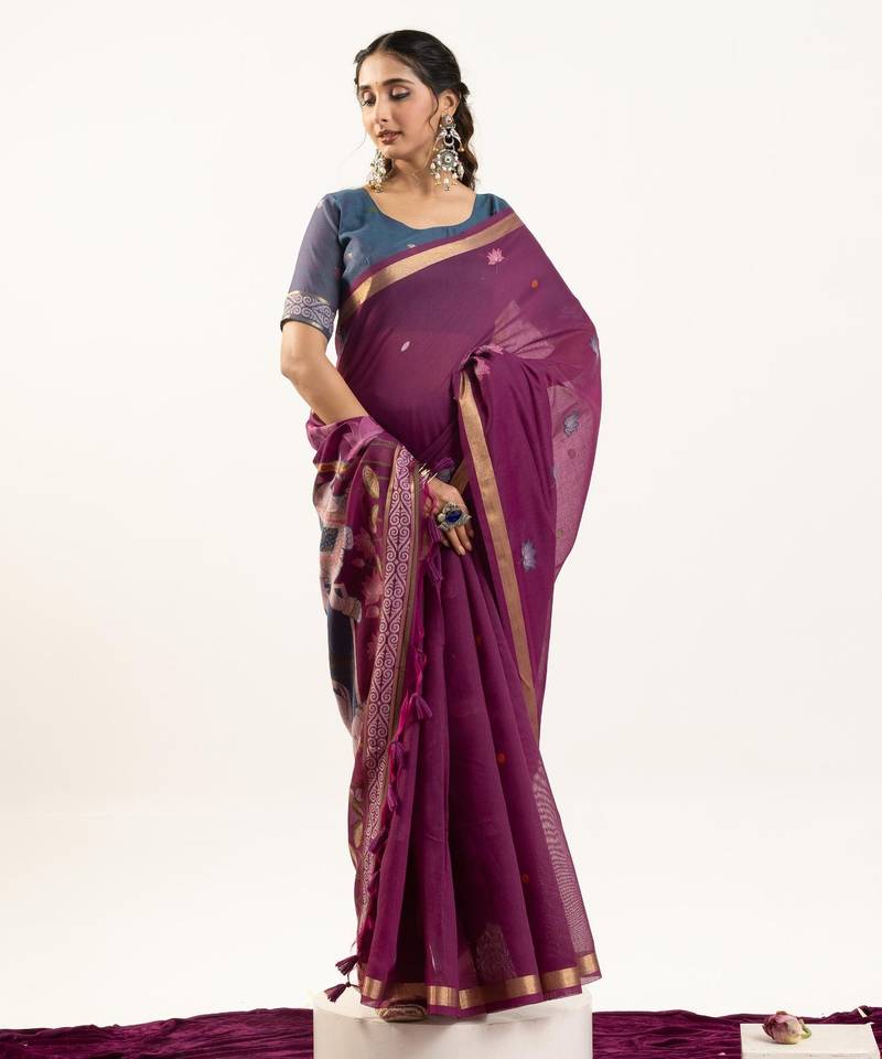 Plum color lotus , musa and zari weaving  muga cotton saree