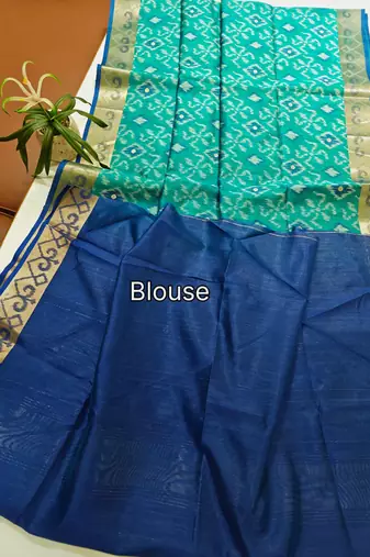 aqua blue raw silk pochampally ikkat saree with zari border