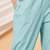 Women’s solid blue lycra ankle-length pants with side pockets