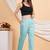 Women’s solid blue lycra ankle-length pants with side pockets