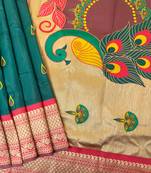 Dark green color peacock design with zari weaving banarasi paithani silk saree