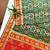 Dark green color zari and meena weaving patola silk saree