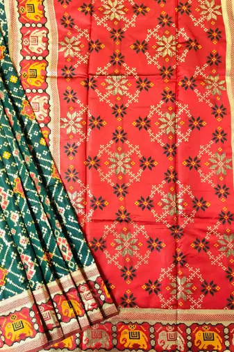 dark green zari and meena weaving patola silk saree