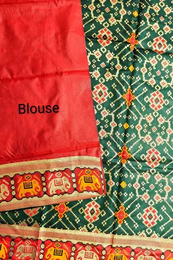 dark green zari and meena weaving patola silk saree