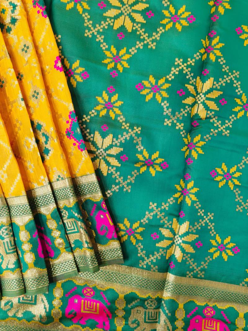 Yellow color zari and meena weaving patola silk saree