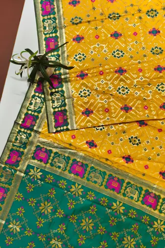 yellow zari and meena weaving patola silk saree