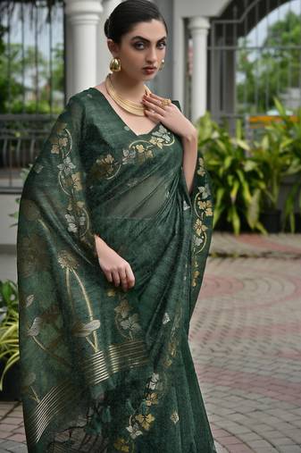 Dark green color double shaded zari weaves jute linen silk saree