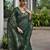Dark green color double shaded zari weaves jute linen silk saree