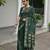 Dark green color double shaded zari weaves jute linen silk saree
