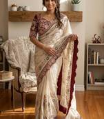Cream silk blend embroidered saree