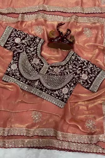 peach satin embroidered saree with designer maroon blouse