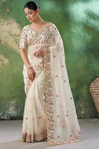 Cream silk blend embroidered saree