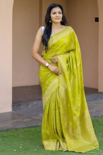 Parrot green silk blend zari woven saree