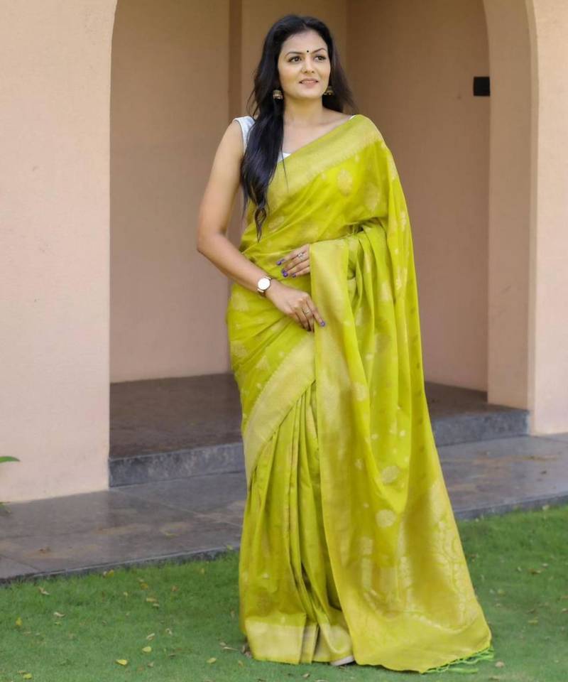 Parrot green silk blend zari woven saree