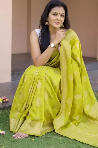 Parrot green silk blend zari woven saree