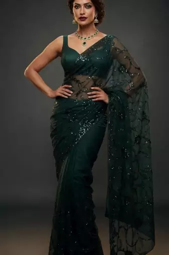 Dark green net embroidered saree