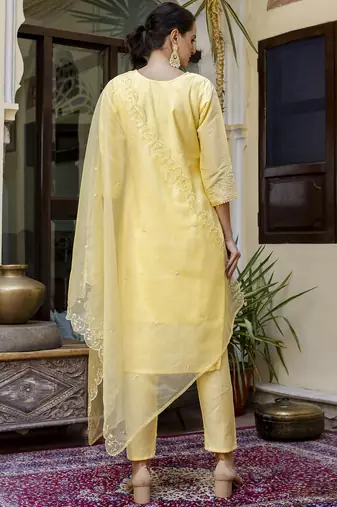 yellow silk embroidered kurta set with floral work