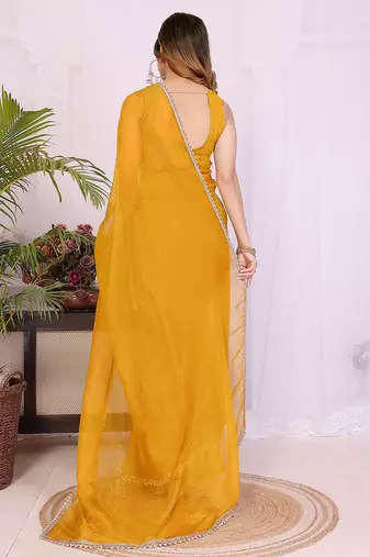 yellow silk tissue saree with hand woven blouse