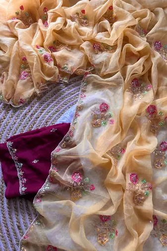light peach silk saree with embroidered cutdana work