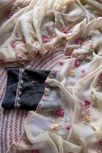 beige silk blend saree with embroidery cutdana work