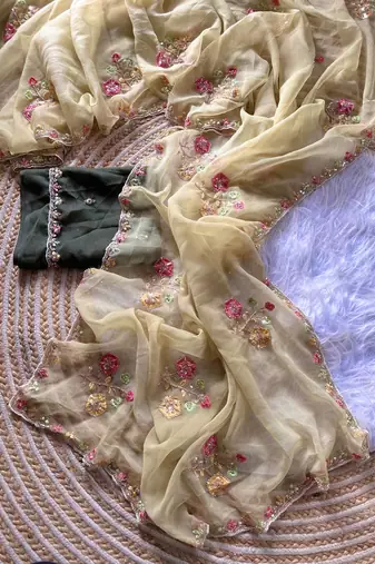 beige silk blend saree with embroidery cutdana work