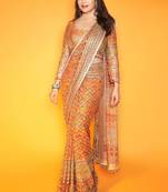 Premium orange chinon silk saree with real mirror work & print
