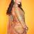 Premium orange chinon silk saree with real mirror work & print