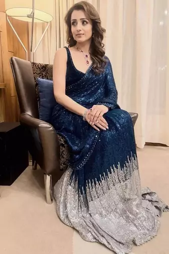 Heavy georgette saree with dual sequins & cutwork