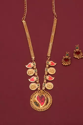 gold brass necklace set with red stone detailing