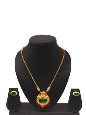 gold metal necklace set with green stone work 1