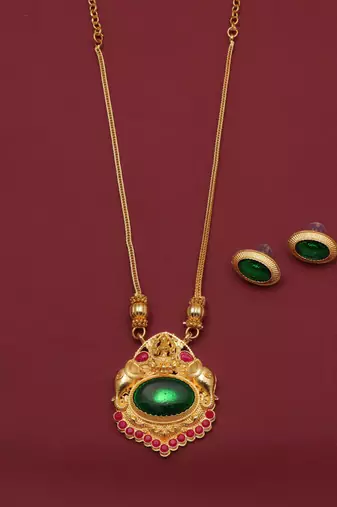 gold metal necklace set with green stone work