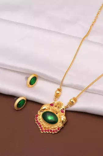 gold metal necklace set with green stone work