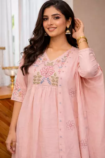 light pink silk kurta set with embroidered thread work