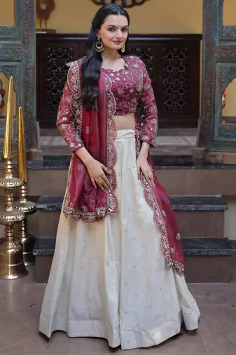 off white silk engagement lehenga with zari sequins work