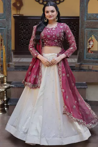 off white silk engagement lehenga with zari sequins work