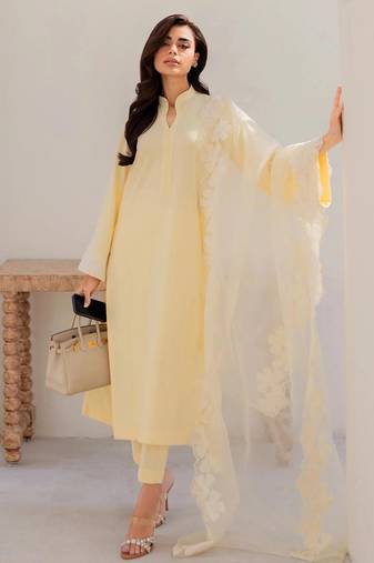 Yellow chanderi silk heavy thread embroidery on sleeve and dupatta kurta pant set