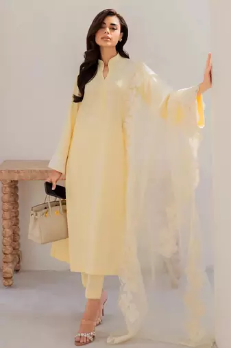 Yellow chanderi silk heavy thread embroidery on sleeve and dupatta kurta pant set